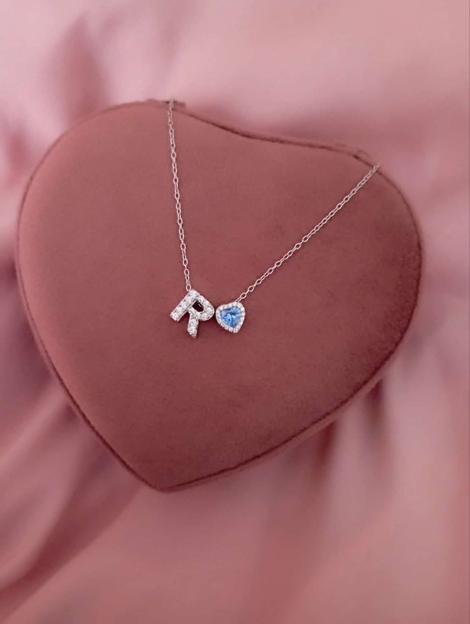 Collana lettera passante zirconata + cuore passante azzurro -argento 925