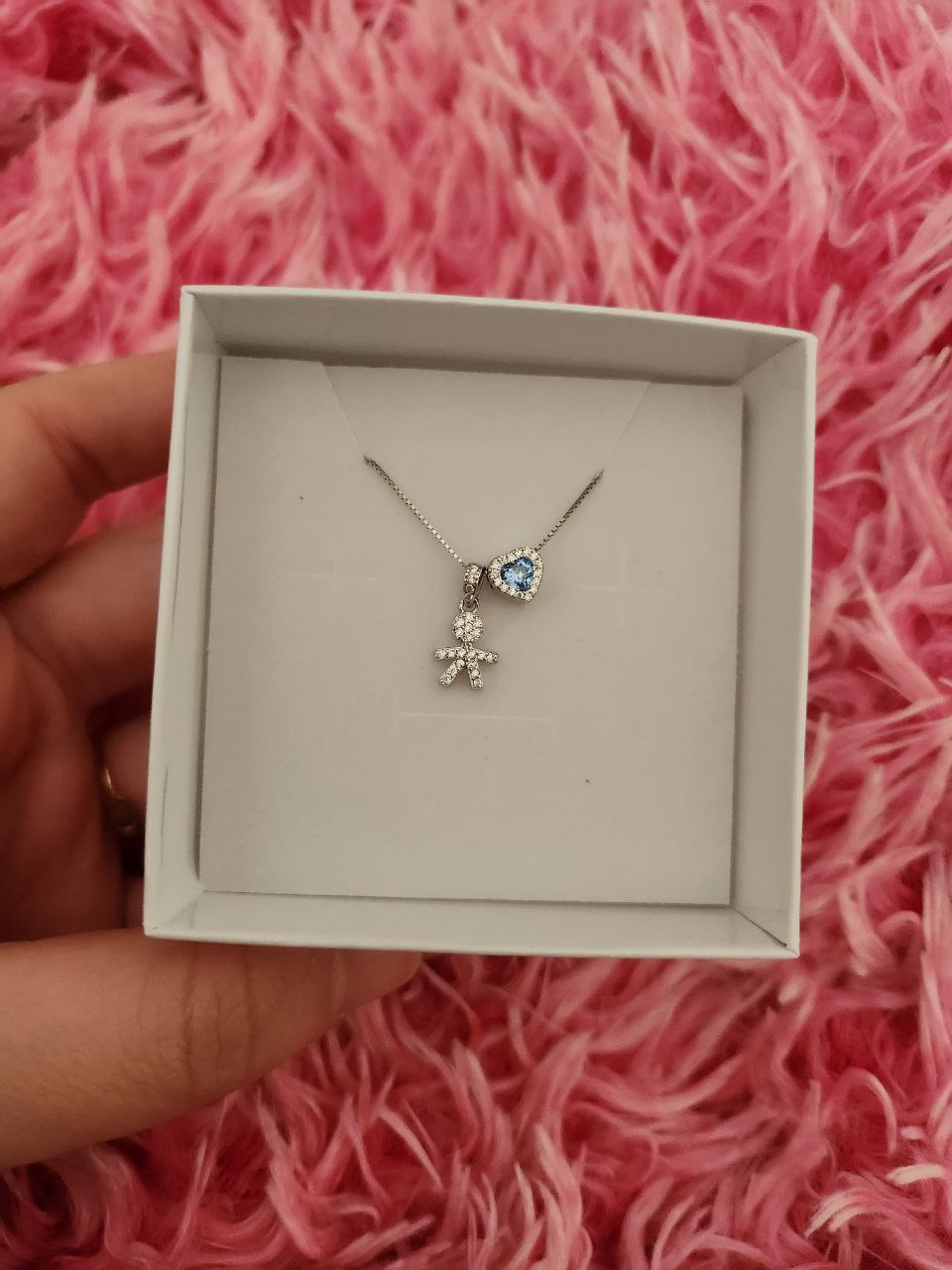 Collana con bimbo pendente e cuore passante azzurro - argento 925