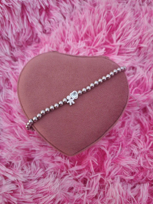Bracciale perline con bimbo passante e acquamarina