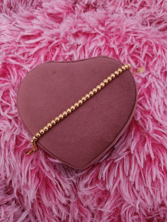 Bracciale con perline 6mm gold