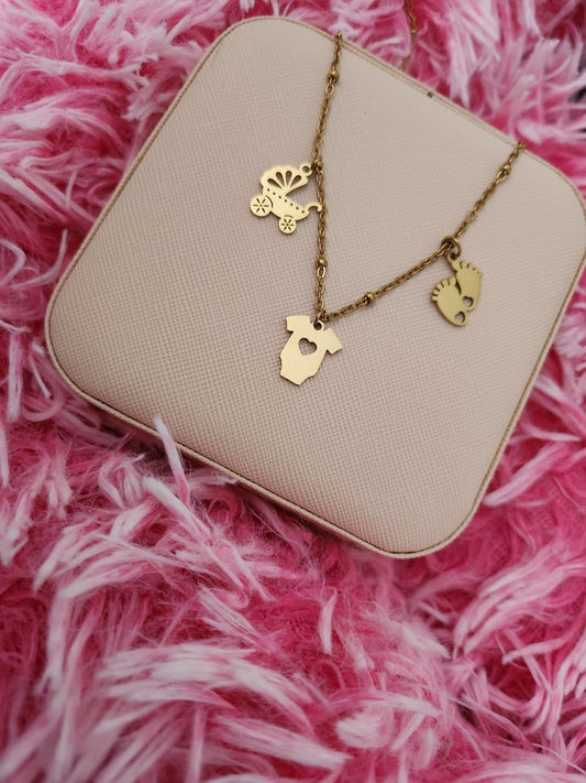 Collana perline con tre charm