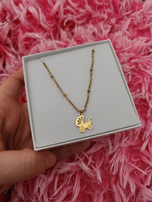 Collana perline e passeggino gold