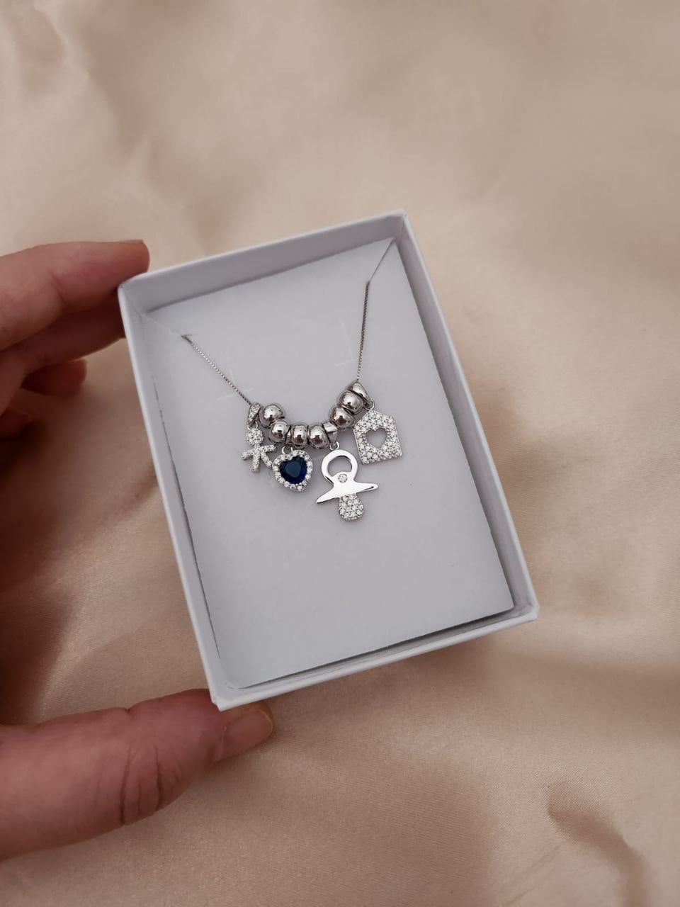 Collana con bimbo, cuore, ciuccio e casetta - argento 925