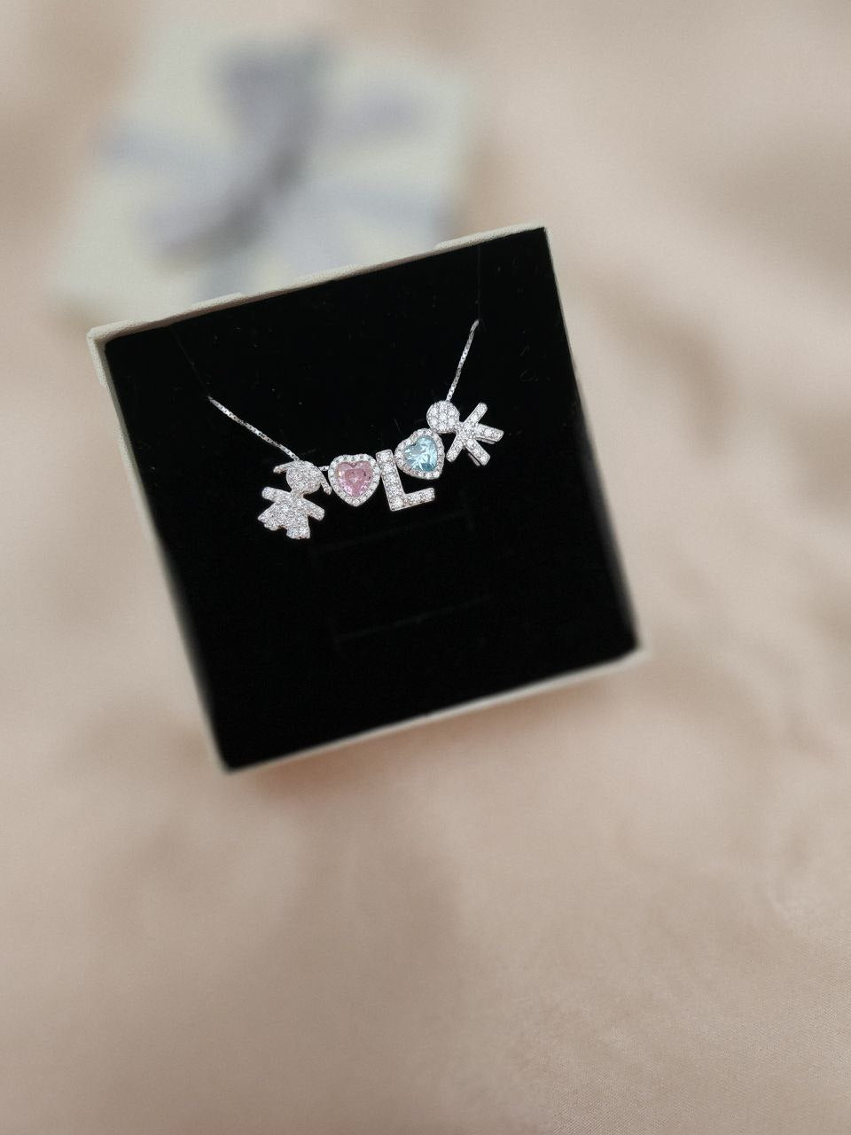 Collana con due bimbi + due cuori + iniziale - argento 925