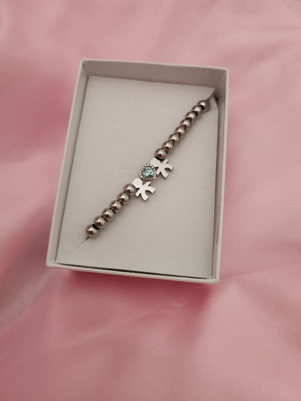 Bracciale perline con due bimbi e cuore acquamarina