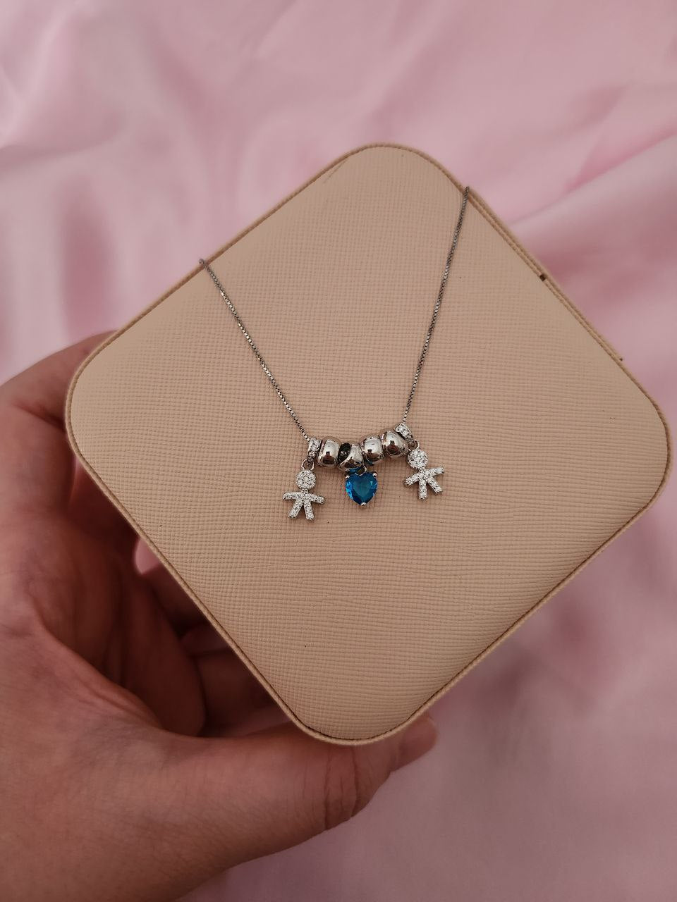 Collana con due bimbi e cuore azzurro pendente - argento 925