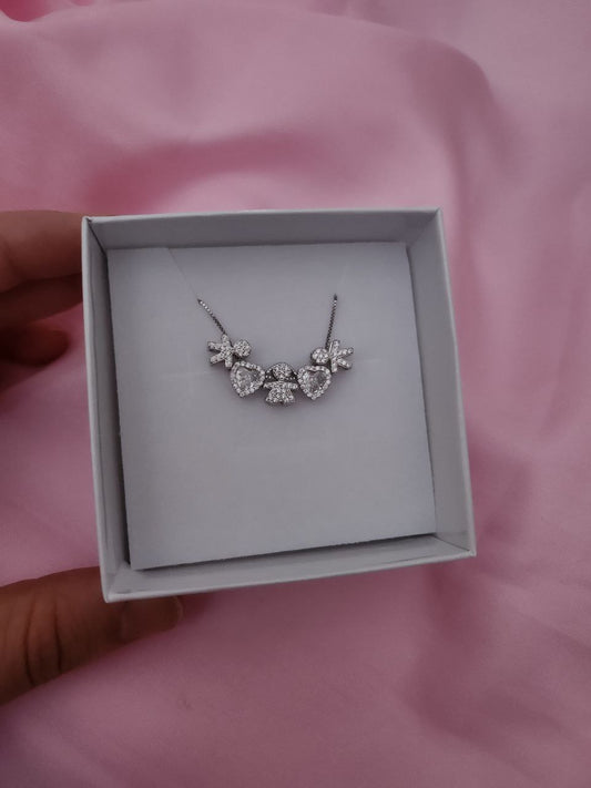 Collana con tre bimbi passanti e due cuori - argento 925