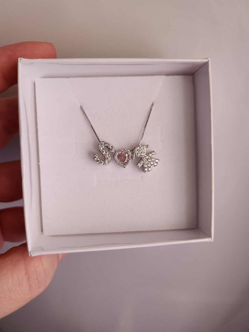 Collana con iniziale personalizzata + cuore rosa + bimba passante + argento 925