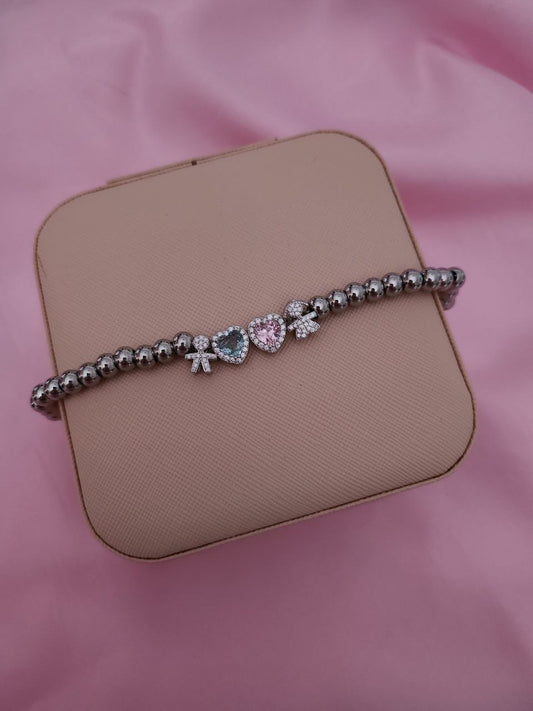 Bracciale perline con bimbo e bimba e cuori interni acquamarina e rosa - argento 925