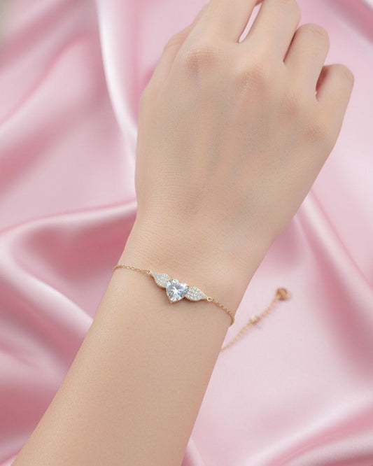 Bracciale cuore con ali gold