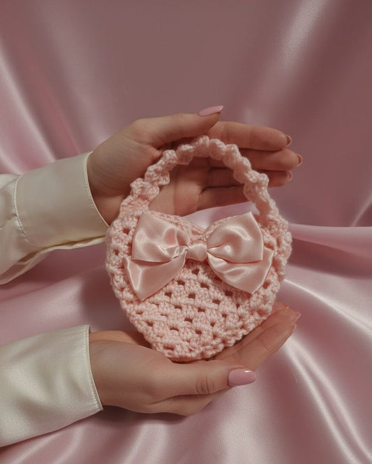 Borsetta da polso con fiocco rosa