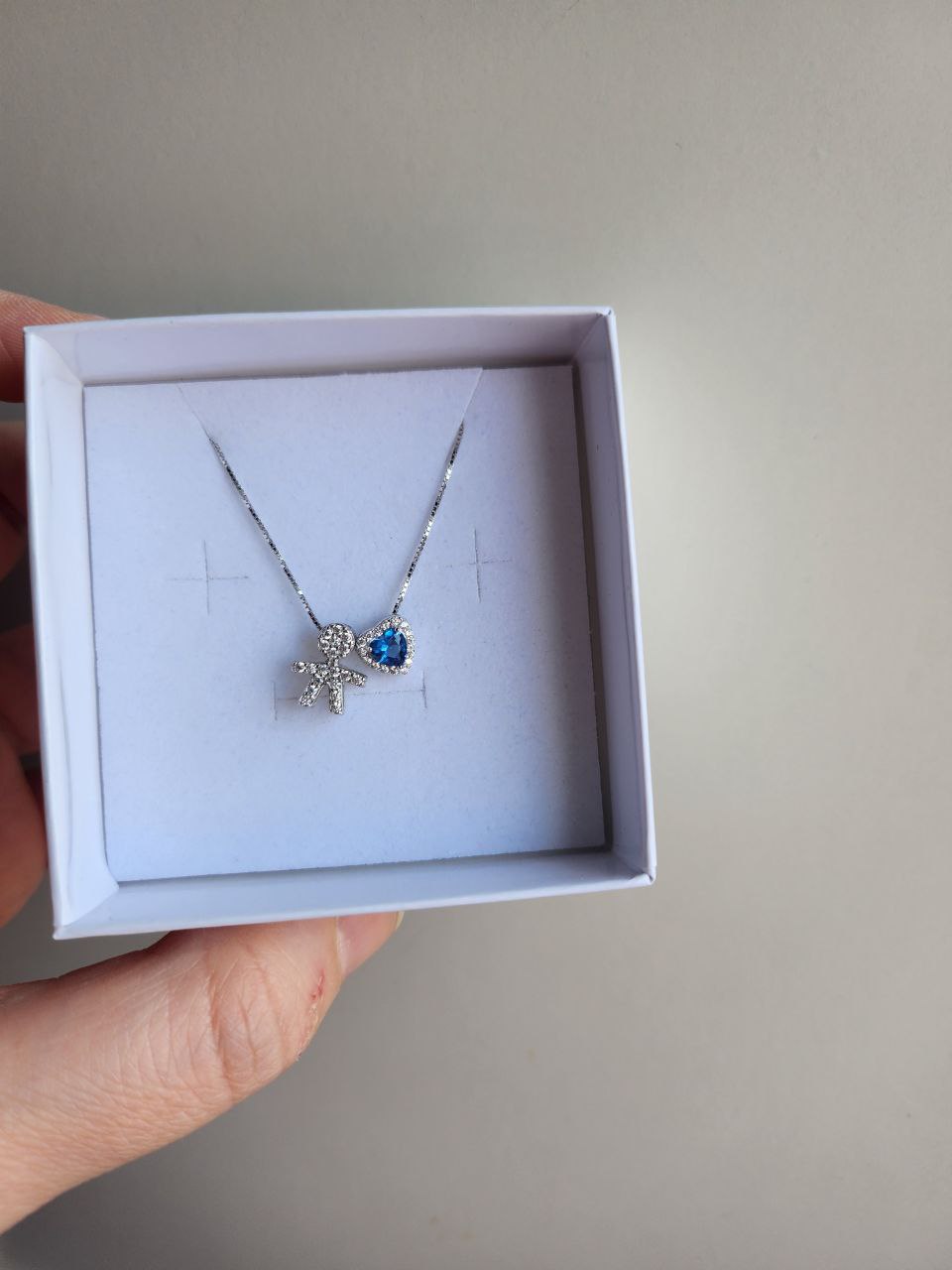 Collana con bimbo zirconato e cuore azzurro - argento 925